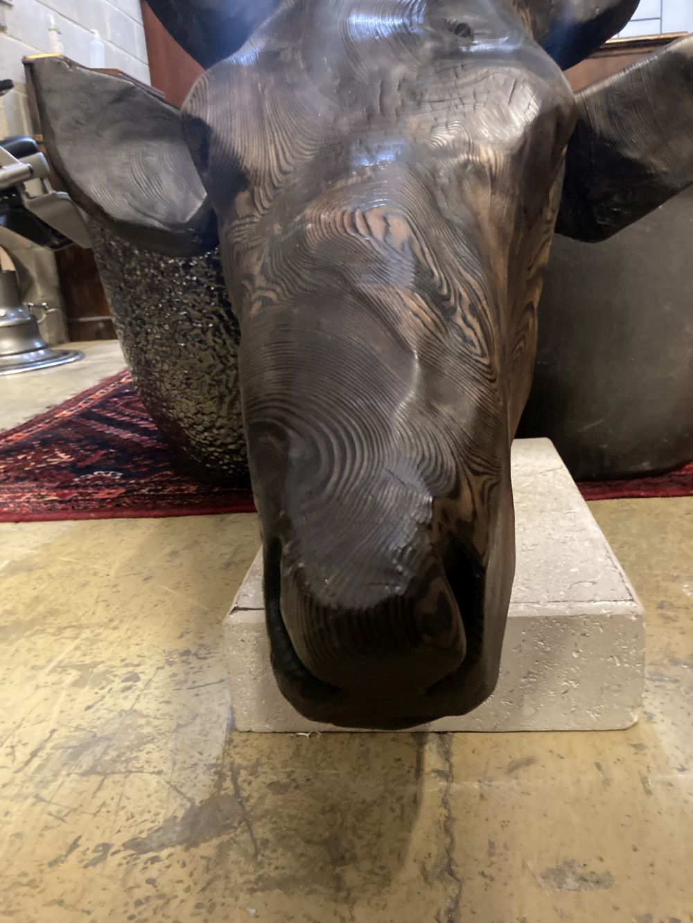 A large carved pine moose head sculpture, height 132cm
